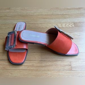 Orange Slip On Flat Sandals.  Never worn. Size 8.5